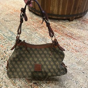 Authentic Dooney & Bourke shoulder bag. Dark olive green and tan.  Zipper works.